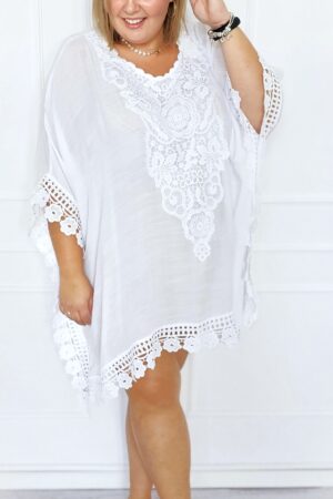 Ponczo w kolorze białym super model na lato , idealne na strój kąpielowy oraz do codziennych stylizacji
