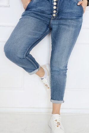 Spodnie jeansowe z gumką w pasie  ozdobnymi guzikami - rozmiary