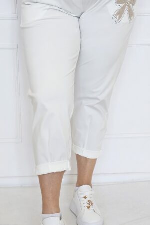 Spodnie materiałowe z ozdobną kokardą na przodzie - biała