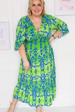 Sukienka z dekoltem V z gumka w tali , wzór po całości - zielona