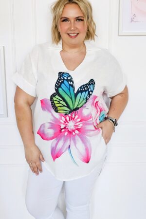 Bluzka koszulowa z asymetrycznym dołem motyw motyl i kwiaty